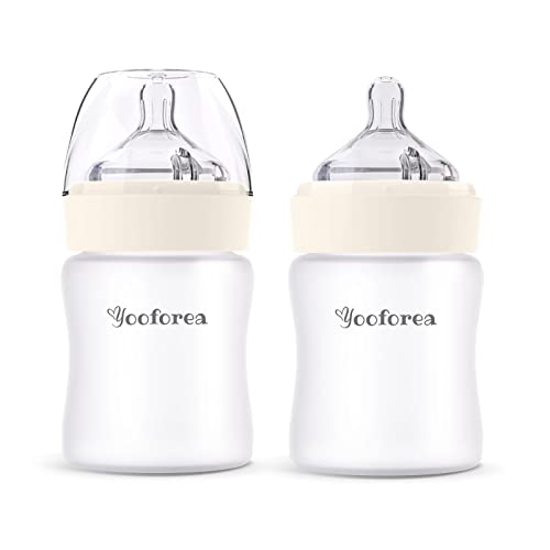 Image of Yooforea Silicone Coated Glass Baby Bottle, 2M+ Medium Flow Nipple I Anti-Colic, Wide Neck, Stable Base I Medical-Grade Silicone Coating for Shatter Protection, BPA BPS PVC Free (2 Pack, 5 Oz-Cream)