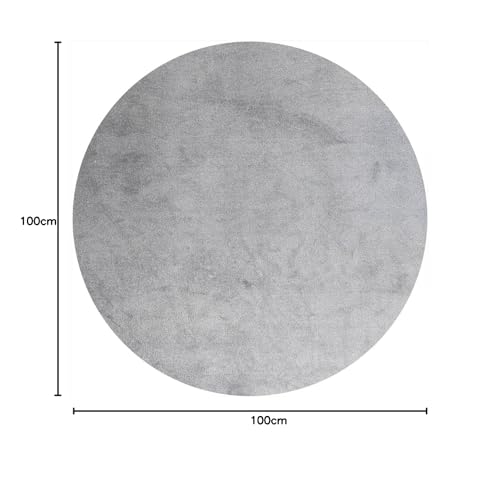 Tapis rond uni gris Tadi & Imperio2006 idéal pour réchauffer un petit salon