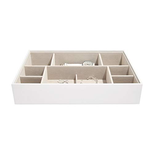 Progettato a Londra. Dimensioni: 36 x 25 x 7 cm