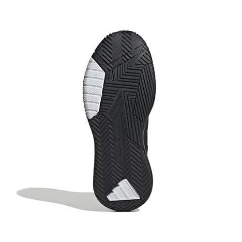 Vista de la suela de las zapatillas de baloncesto adidas Own The Game 3, mostrando el diseño de tracción y materiales utilizados