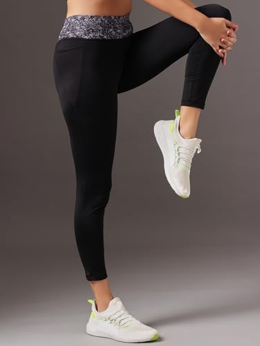 Image of Clovia Women's Snug-Fit High Rise Active Tights with Printed Waistband in Black