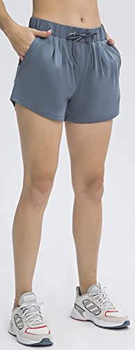 Image of Ukaste Women's Stretch Workout Running Athletic Shorts with Pockets - 3 Inch