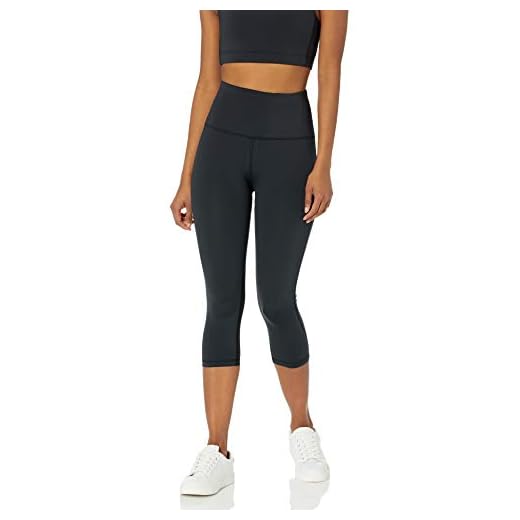Amazon Essentials Legging de sport 7/8 à taille haute modelant (existe en grandes tailles) Femme, Noir, M