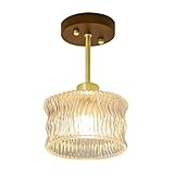 Matériaux et construction durable : Fabriqué avec une véritable plaque plafond en bois massif, des accents métalliques au fini laiton et du verre transparent texturé épais, ce luminaire semi-encastré est conçu for une durabilité durable et une beauté intemporelle.