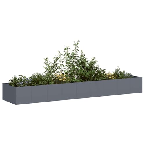 Jardinière surélevée contre terre basse avec pot de fleurs métal