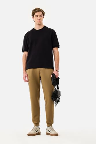 Image of SNITCH Men Track Pants | Relaxed Fit with Contrast Side Stripes & Zippered Pockets | Polyester Blend Fabric for Athletic & Street Wear | Stretchable & Comfortable Design