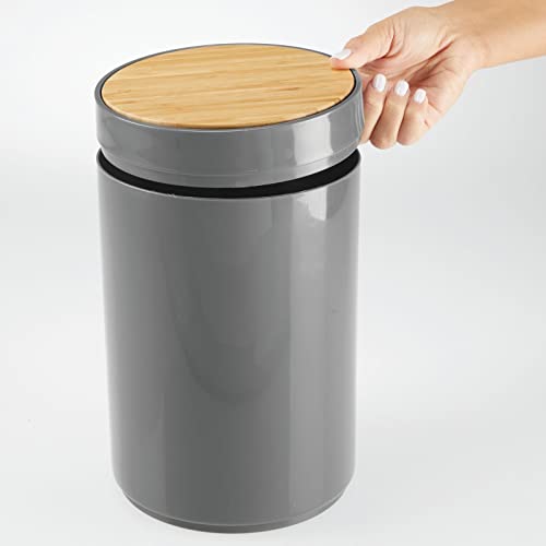 Image of mDesign Plastic Round Trash Can Small Wastebasket - Garbage Bin Container with Swing-Close Lid - Bathroom Garbage Basket - Holds Waste, Recycling - 1.3 Gallon - Basa Collection - Charcoal Gray /Natural