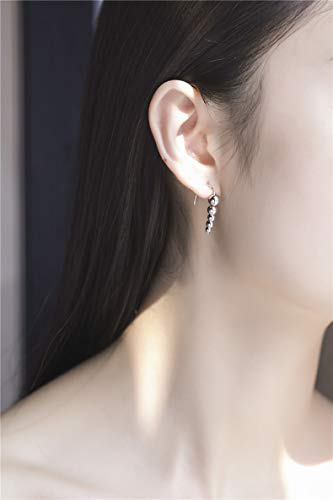 Boucles d'oreilles pendantes argent pour un mariage chic