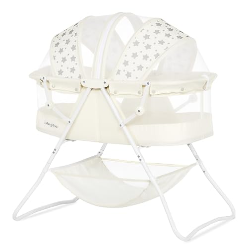 Image of Dream On Me Karley Bassinet in French White, Lightweight Portable Baby Bassinet, Quick Fold and Easy to Carry , Adjustable Double Canopy, Indoor and Outdoor Bassinet with Large Storage Basket.