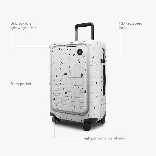 Image of Monos Carry-On Pro Plus Luggage 23 Inch - Hardside Spinner Suitcase with TSA Lock & Laptop Front Pocket | Airline Approved, 42L Polycarbonate Rolling Carry On | Fits 16 inch Laptop | Terrazzo, White