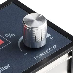 Close-up of the rotary encoder knob labeled RUN/STOP on the speed controller.