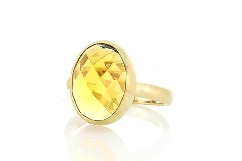 Bague en or massif citrine véritable et son élégant chaton ovale