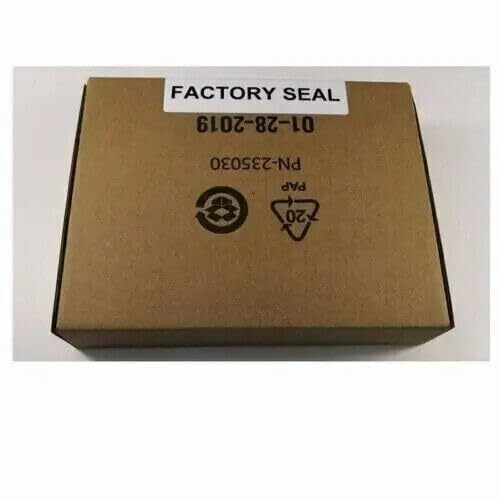 Brown cardboard box with a 'FACTORY SEAL' label and recycling symbols, indicating new product packaging.