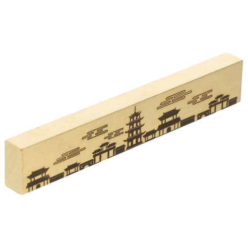 Pisapapeles de latón dorado para organizar tu estudio con un toque rectangular antiguo