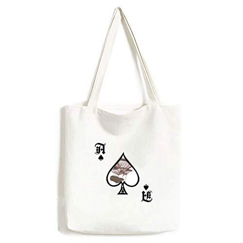 Sac à main motif champignon et pique de poker idéal pour vos balades et sorties culturelles