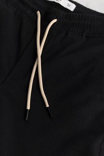 Image of SNITCH Black Textured Relaxed Trousers