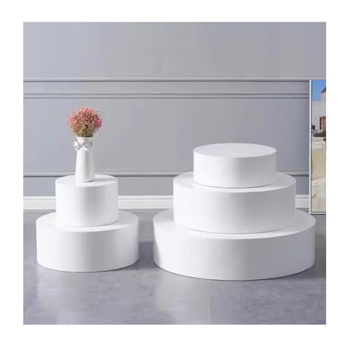 Présentoirs sur mesure et socles cylindriques pour boutique de mode et mariage