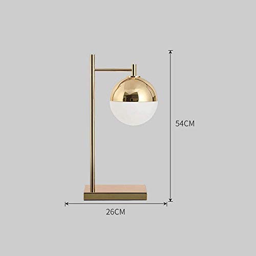 Lampe de table ronde dorée pour illuminer vos soirées lecture dans la chambre ou le salon