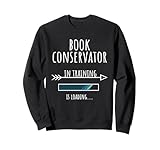 Book Conservator in training is loading