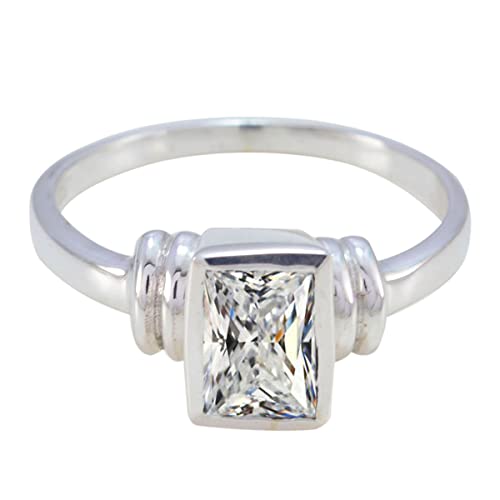 Bague fiançailles émeraude pour un mariage chic et minimaliste en argent