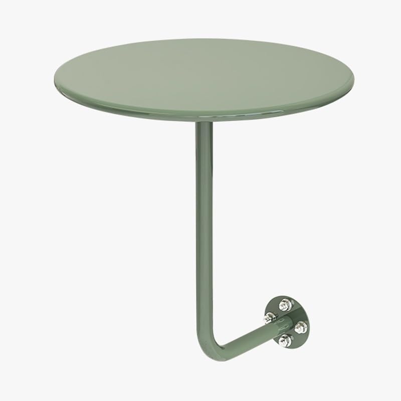 Table basse murale ronde verte : la solution gain de place studio