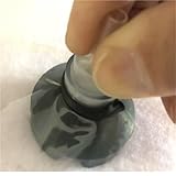 Carbon fiber resin guided silicone nozzle interface used for self sealing vacuum...