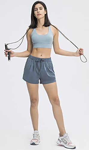 Image of Ukaste Women's Stretch Workout Running Athletic Shorts with Pockets - 3 Inch