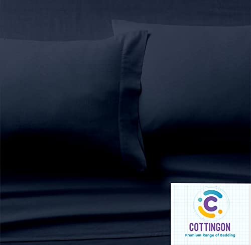 Image of Cottingon 4 PC Split /Flex Top King Sheets Sets for Adjustable Beds, Luxury Microfiber Half Split King Sheets for Sleep Number Beds fits 15 to 18 Inch Deep Mattress, Navy Blue