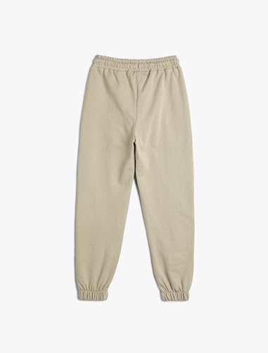 Pantalones de chándal niños de algodón en color beige con bolsillos prácticos 2