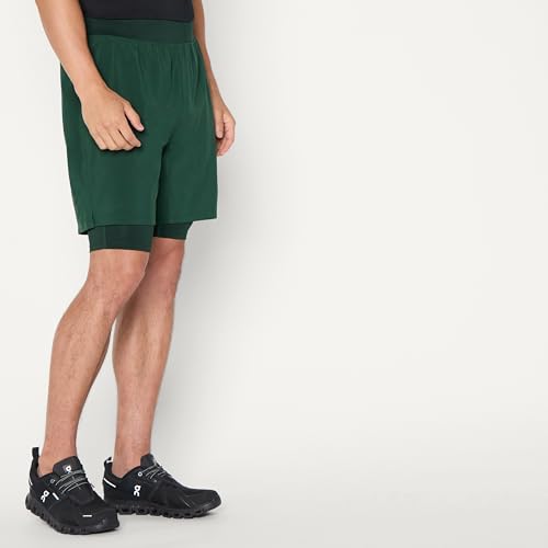 Image of Amazon Essentials Men's Athletic Running Training Shorts, Performance Stretch Woven Workout Shorts, 7 inch