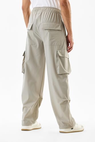 Image of SNITCH Men Cargo Pants | Relaxed Fit with Elastic Waistband & Drawstring | Durable Nylon Elastane Blend & Multiple Utility Pockets for Casual & Streetwear Occasions