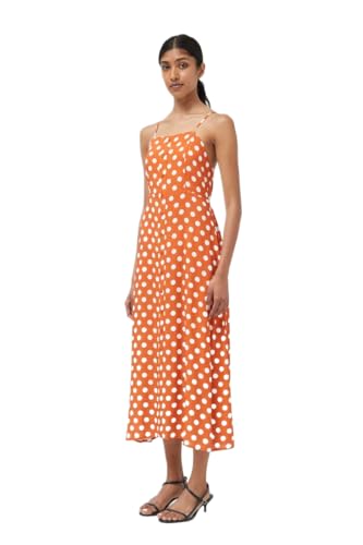 Robe longue à pois pour camoufler les complexes avec style