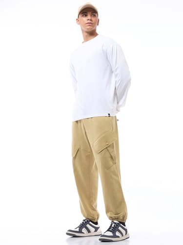 Image of Bewakoof Men's Cotton Super Loose Fit Joggers|Bewakoof Air 1.0 | Track pants for man | Lower for man | Trouser for men | Baggy trackpants for men | Multipurpose | Mens Lower Activewear | Utility Pockets | Lightweight & Flexible Elastic Waist | Casual Joggers | Loose Fit