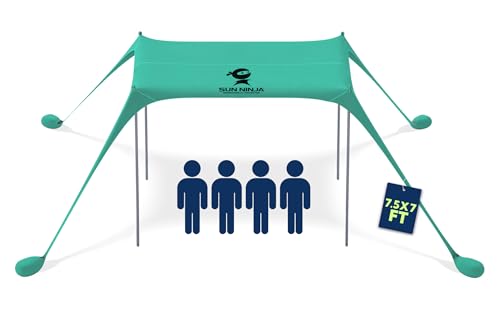 SUN NINJA Pop Up Beach Tent set up on a beach