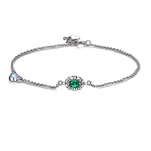Bracelet émeraude ovale en or blanc 18 carats à porter en soirée chic