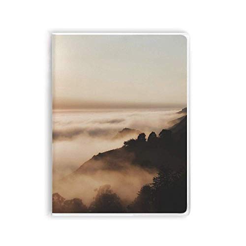 Carnet coucher de soleil et montagne brumeuse pour libérer votre créativité dans ce journal