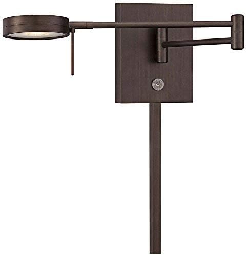 Close-up of the GEORGE KOVACS P4308-647 LED lamp head and swing arm mechanism.