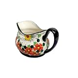 Le pichet à crème apporte une touche de charme moderne et d'élégance intemporelle à n'importe quelle table ou décoration de cuisine.