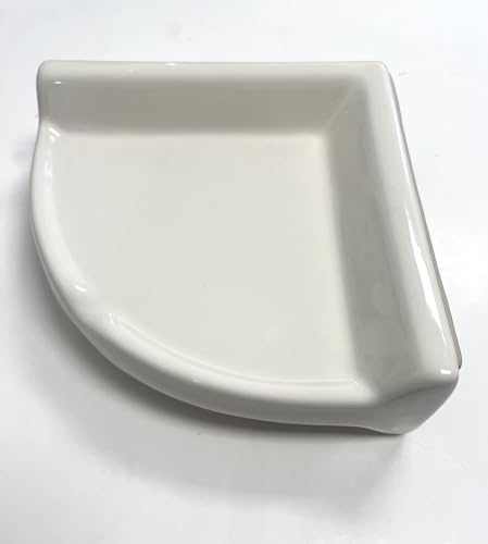 Almond ceramic corner shelf, 8-3/4 x 2-5/8 in and 8 lb, with a rear lip that sets behind surrounding tile in thinset