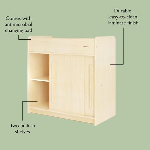 Foundations SafeGlide Daycare Changing Table, Durable Wood Construction, Built-in Shelving for Ample Storage, Gliding Doors, Adjustable Safety Strap, Includes Foam Mattress Pad (Natural)