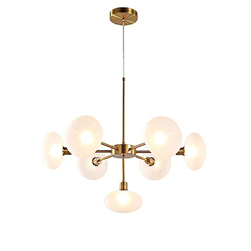 Suspension Spoutnik or moderne pour illuminer une table de salle à manger
