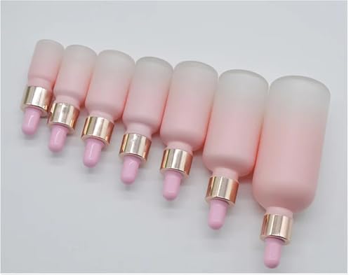 Flacon compte-gouttes en verre rose givré et bague or raffinée 100ml