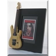 Wooden Picture Frame 12 x 18 cm (4"x6" photo) The miniature guitar is brand new replica 1:4 scale (25 cm tall) Best Quality. no comparison to others, flawless, and made of wood. NON-playable, and for display/decoration only. This collectible item is ...