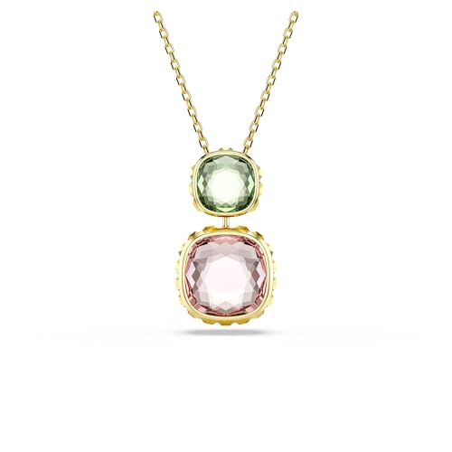 Infuso d'arte: il design placcato in tonalità oro si collega alla catena con uno Swarovski ReCreated crystal verde; in basso, il design reversibile consente di sfoggiare un cristallo blu o rosa
