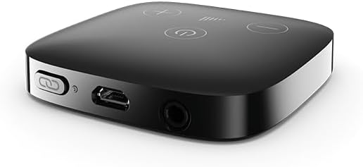 Unitron TV Connector device, a small black square with buttons on top and ports on the side.