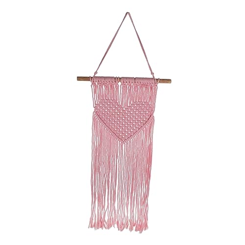 Macramé mural à pompons pour salon chaleureux bohème