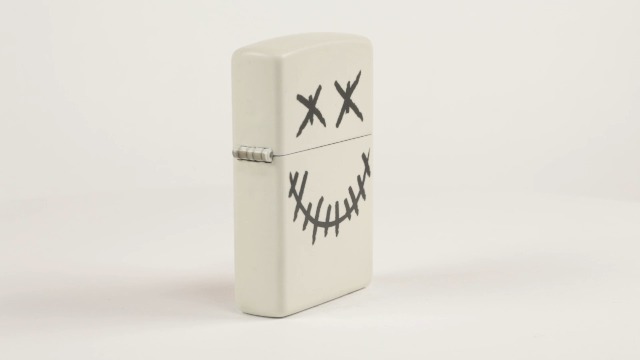 Stitched Skull Face Smile Zippo Lighter (Glow in The Dark Matte)