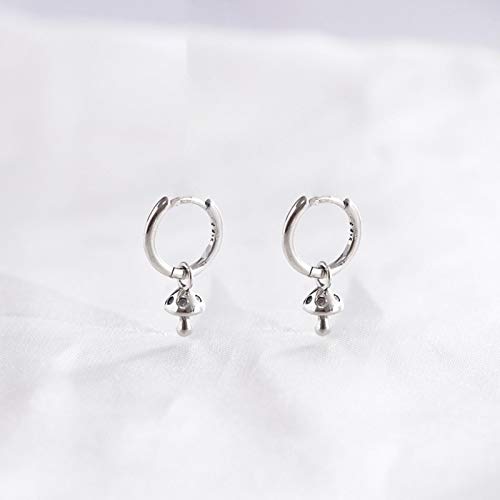 Clous d'oreilles champignon en argent parfaits pour sublimer un look de mariage