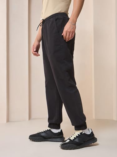 Image of Bewakoof Men's Solid Regular Fit Cotton Blend Joggers
