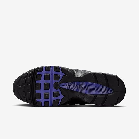 Дното view of Nike Air Max 95 OG shoe, showing the sole pattern and purple accents.